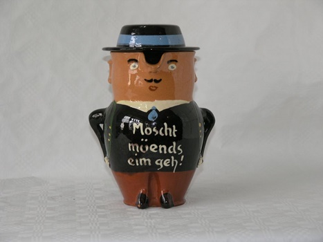 Moscht müends eim geh, Mostkanne